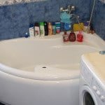 Кутова ванна: фото дизайну інтерєру