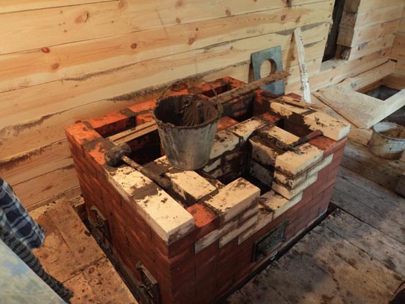 Цегляна піч для лазні з топкою з передбанника своїми руками: поетапна технологія і правила кладки Цегляна піч для лазні з топкою з передбанника своїми руками: поетапна технологія і правила кладки