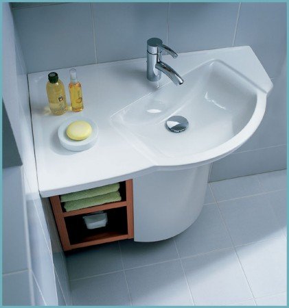 Кутова раковина з тумбою: зберігаємо простір у ванній кімнаті