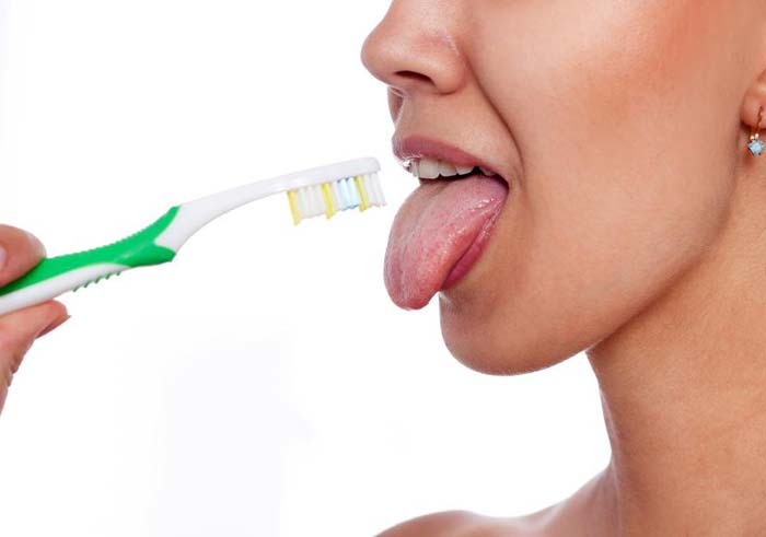 Білий наліт на язиці у дорослих: у чому причини і яке лікування необхідно + фото