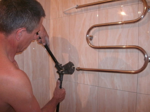 Як встановити полотенцесушитель