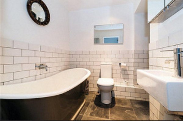 Коричневий підлога у ванній кімнаті: різноманіття обробки та дизайнерські прийоми