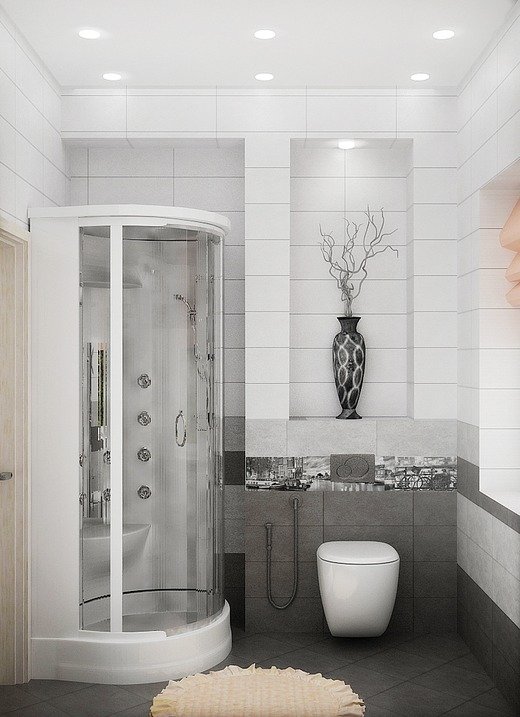 Невелика душова з туалетом, виконана у сіро білих тонах Невелика душова з туалетом, виконана у сіро білих тонах