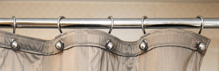 Універсальний засіб боротьби з бризками у ванній — фіранка