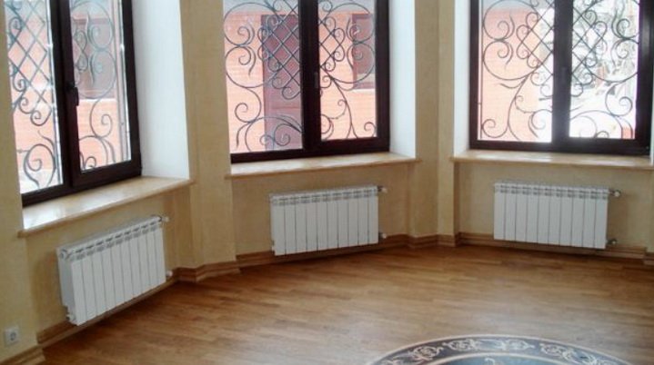 Навіщо застосовувати радіатори разом з теплими підлогами