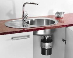 Подрібнювач (діспоузер) для харчових та органічних відходів. Як вибрати і встановити прилад на раковину