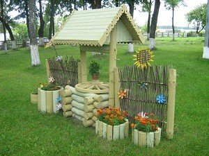 Як зробити декоративний колодязь на дачі своїми руками: матеріали, етапи робіт, оформлення колодязя, фото і відео