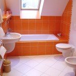 Фото дизайну ванної кімнати в помаранчевих тонах