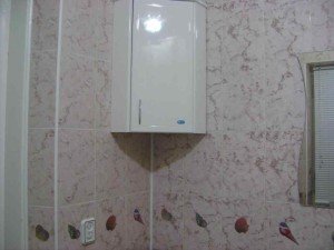 Кутовий шафа у ванну кімнату (фото)