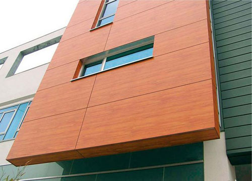 Оздоблення фасаду будинку панелями: огляд матеріалів і технологій