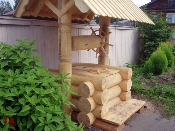 Як зробити декоративний колодязь на дачі своїми руками: матеріали, етапи робіт, оформлення колодязя, фото і відео