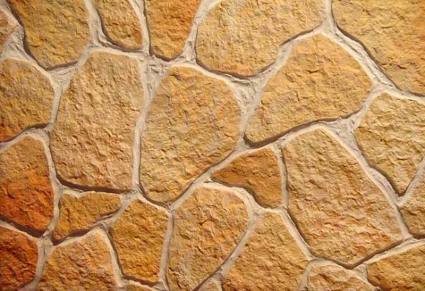 Облицювання фасадів натуральним каменем: інструкція по обробці