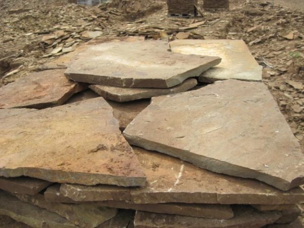 Облицювання фасадів натуральним каменем: інструкція по обробці