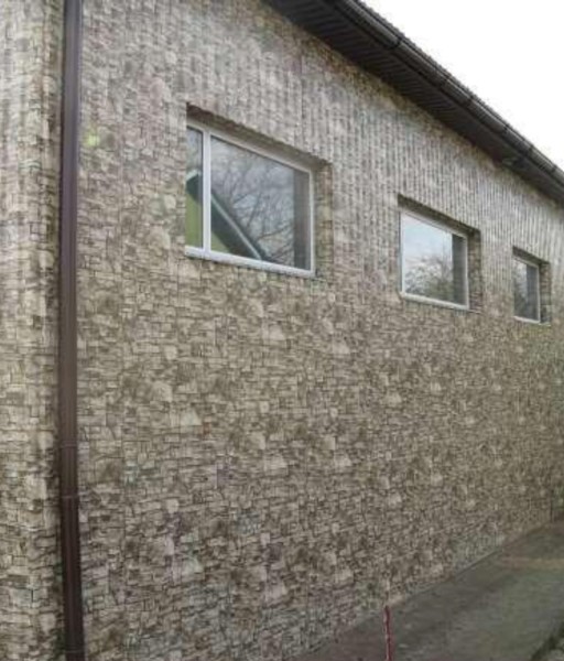 Металевий сайдинг під камінь: переваги, недоліки та керівництво з монтажу