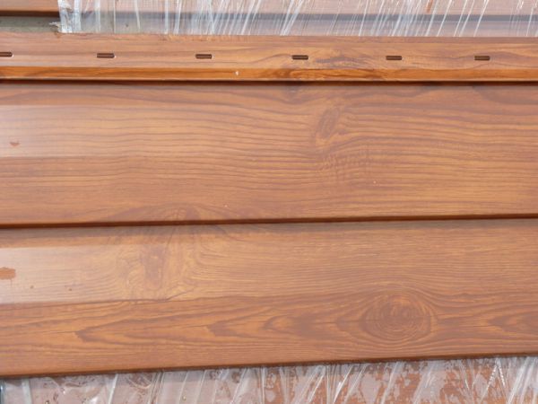 Металлосайдінг Корабельна дошка: міцна і красива обшивка для вашого будинку Металлосайдінг Корабельна дошка: міцна і красива обшивка для вашого будинку