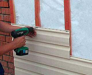 Облицювальні панелі для фасаду будинку Облицювальні панелі для фасаду будинку