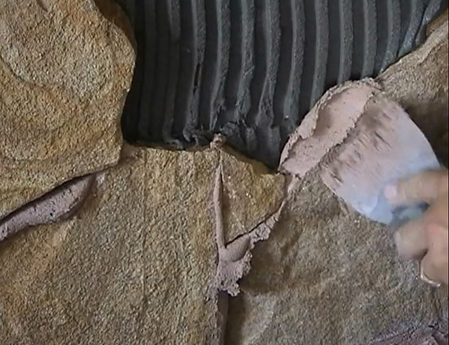 Облицювання фасадів натуральним каменем: інструкція по обробці