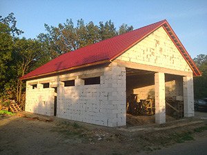 Будівництво гаража з піноблоків своїми руками: фундамент, стіни, дах, відео інструкція