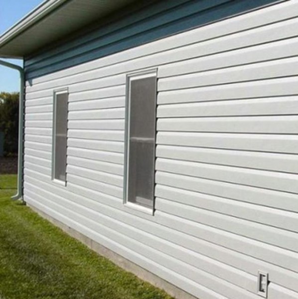 Обробка будинку сайдингом – як створити красивий фасад своїми руками